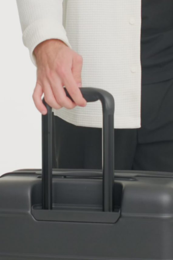 The Medium Check-In Roller in All Black - Image 6