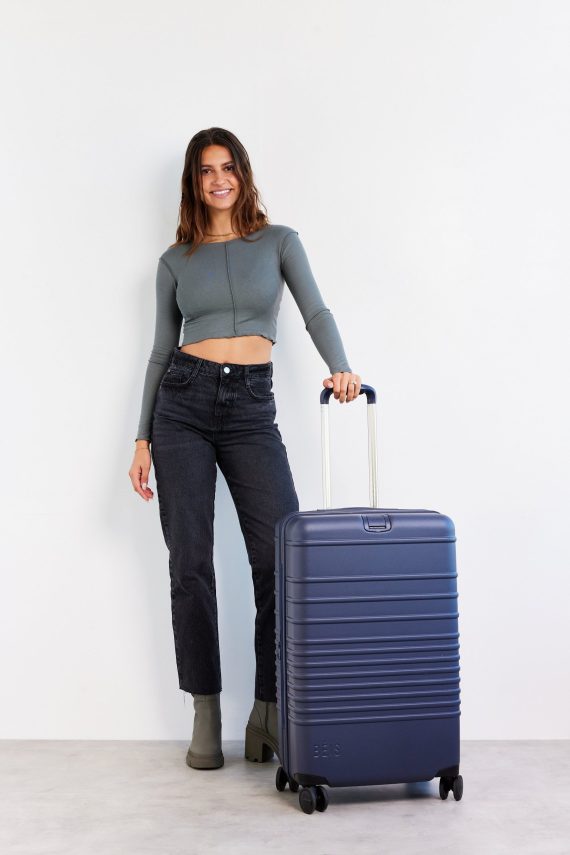 The Medium Check-In Roller in Navy - Image 5