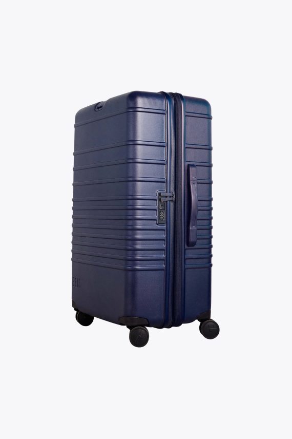 The Large Check-In Roller in Navy - Image 3