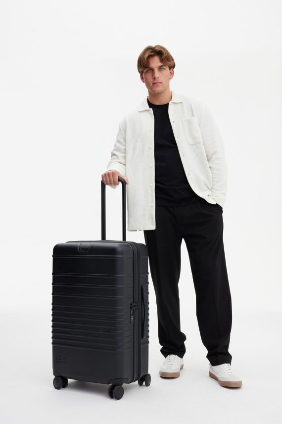 The Medium Check-In Roller in All Black - Image 5