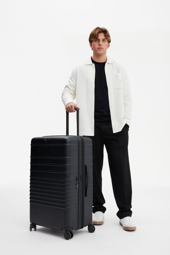 The Large Check-In Roller in All Black - Image 4